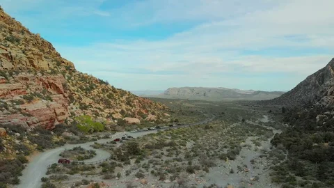Aerial, Red Rock Canyon, pull back, Lost Creek parking, trail, low Stock Footage 106784402
