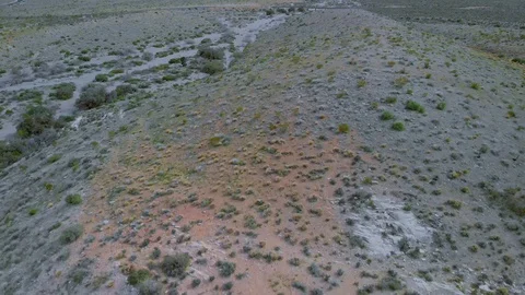 Aerial, Red Rock Canyon, pullback, angle, rocks, desert, sandstone quarry, Stock Footage 106784424