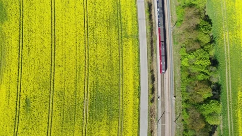 Aerial of red train passing by 4K Stock Footage 235449506