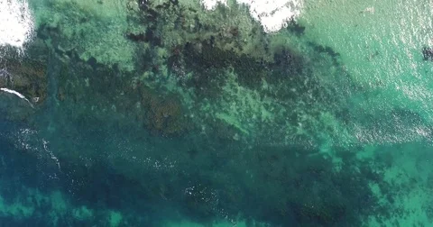 Aerial reef with waves Stockbeeldmateriaal 83865439