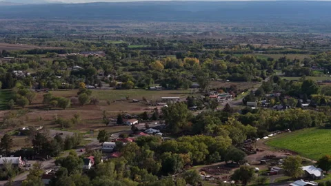 Aerial of residential development in Eckert Colorado in autumn with plateau 스톡 동영상 347314223
