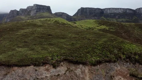 Aerial reveal of distant view of Old Man of Styrr Stock Footage 116109593