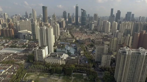 Aerial reveal of Shanghai with empty plot Vídeos de archivo 87671676