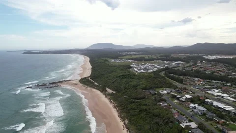 Aerial reveal view of beachfront houses and property, drone 4k Stock Footage