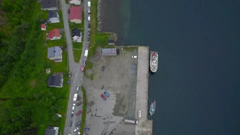 Aerial revealing shot of a long queue of cars parked on the scenic route Stock Footage 251883175