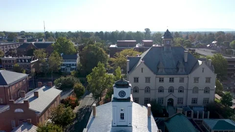 Aerial reverse and boom down to Confederate Soldier memorial to view of Civil Stock Footage 140748216