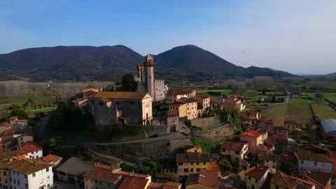 Aerial reverse dorne flight view Nozzano castle Tuscany Village Italy Stock-Footage 184563547