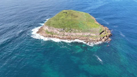 Aerial Reverse Drone Shot of Bird Island, NSW - Flying Toward Shoreline in 4K Stock Footage 314429397