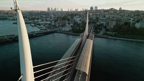 Aerial Reverse Flight Over Golden Horn Metro Bridge Sunrise Stock Footage 345936462