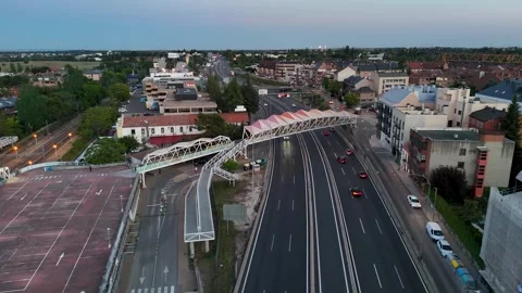 Aerial reverse flight over highway traffic at dusk in Las Rozas, Madrid Stock Footage 336675080