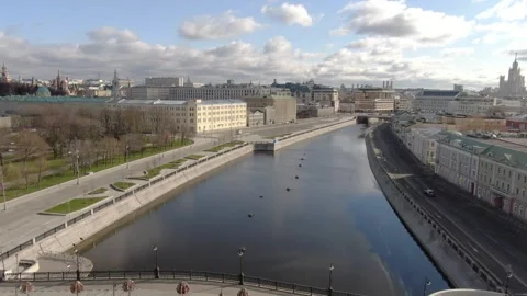 Aerial reverse motion above river and historic district Stock Footage 322804381