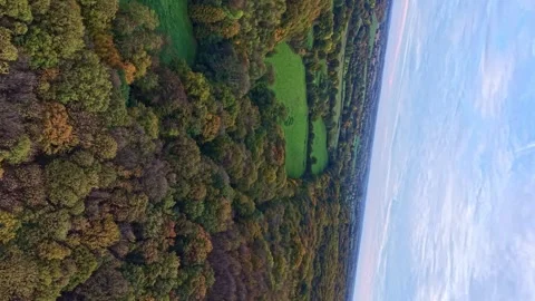 Aerial reverse over the ancient Forêt de Concise in Saint-Berthevin, near Stock Footage 326371697