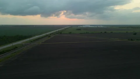 Aerial In Reverse Over Empty Texas, U.S.A., Field After Sunset Stock Footage 188435984