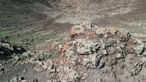 Aerial reverse reveal clip of the dramatic Volcan Calderon Hondo volcano Stock Footage 227762637