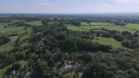 Aerial reverse from top of Box Hill showing A4 in lush Wiltshire countryside on 動画素材 337872652