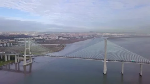 Aerial revolve around Vasco da Gama bridge in Lisbon Stock Footage 160814083
