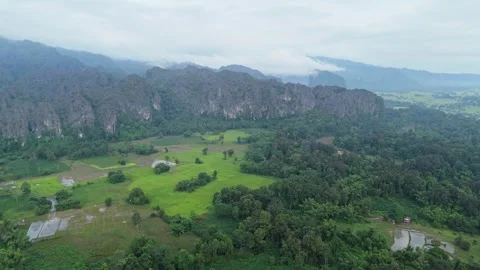 Aerial Rice Fields and Karst Mountains near Kong Lor, Laos Video stock 330594702