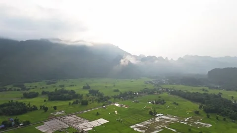 Aerial Rice Fields and Karst Mountains near Kong Lor, Laos Video stock 330594733