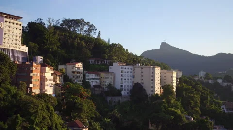 Aerial Rio de Janeiro, Santa Teresa hill with slums and Christ Statue in Brazil Stock Footage