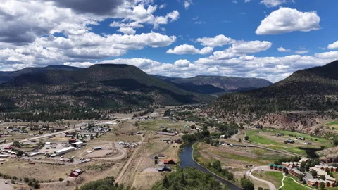 Aerial of Rio Grande River in small mountain town South Fork Colorado in summer Stock Footage 342748014
