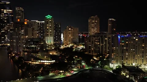 Aerial rise over Brickell Key to reveal Downtown Miami shot in 6k Stock Footage 344976855