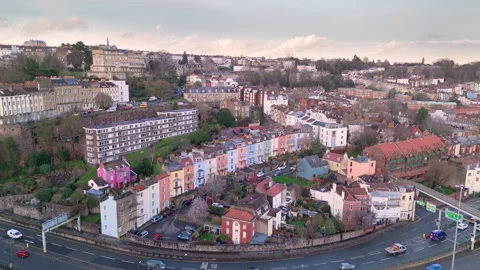 Aerial riser view over colourful Hotwells houses, Clifton on hill, Bristol Stock Footage 267834481