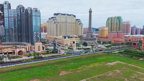 Aerial Rising Cotai Strip Eiffel Tower Parisian Venetian Macao Studio City Stock Footage 334768575