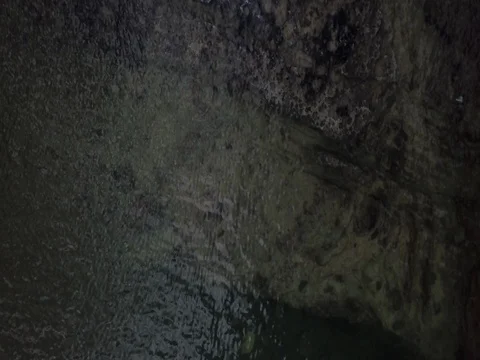 Aerial rising spin view of isolated island in a lake Stock Footage 80047752