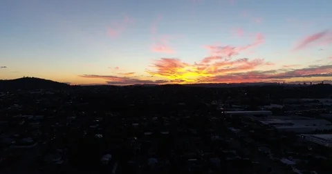 Aerial rising of sunset Stock Footage 75639323