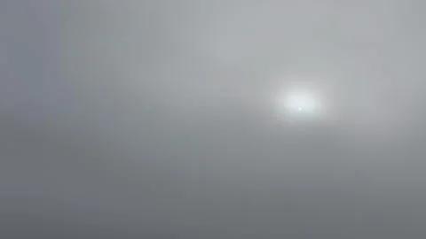 Aerial rising through the thick clouds into clear blue skies Stock Footage 337143971