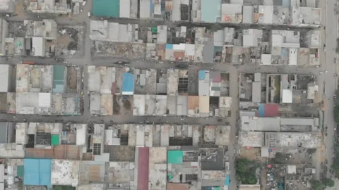 Aerial Rising Top Down View Of Patchwork Rooftops In Downtown Karachi. Stock Footage 162726111