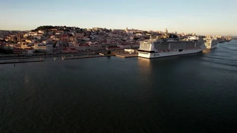 Aerial rising view of Lisbon docks with giant cruise ships in Lisbon, Portugal Stock Footage 219013119