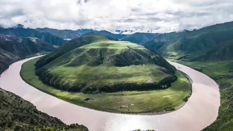 Aerial River Bend Winding Through Green Mountain Valley Stock Footage 341940711