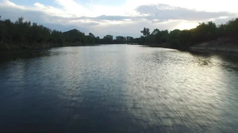 Aerial River Close Flying at Sunset in Forest Stock Footage 65075807