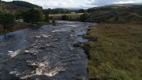 Aerial of river flowing through the forest, Low Level Over River Gauer With Lift Stock Footage 108599005