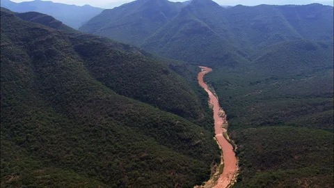 Aerial of river stream flowing across green mountain range, River Olifants Stock Footage 109443207