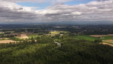 Aerial of river through forest and suburban landscape in Wilsonville oregon Stock-Footage 338351395