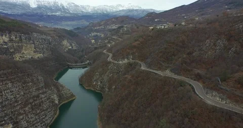 Aerial of river through green mountain forest Stock Footage 89978052