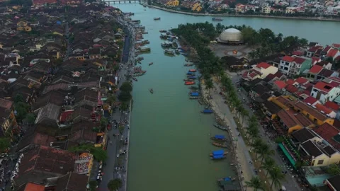 Aerial River View Of Hoi An Waterfront With Dome Building Green Canal Lined By Vídeos de archivo 346120415