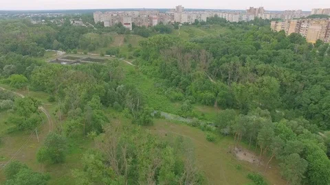 Aerial road along the river above electric pillars Stock Footage
