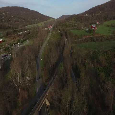 Aerial - Road through Mountains Stock Footage 69720883