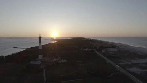 Aerial Robert Moses Lighthouse Push Past LH towards Sunrise 4K@24FPS DLOG Stock Footage 297024204