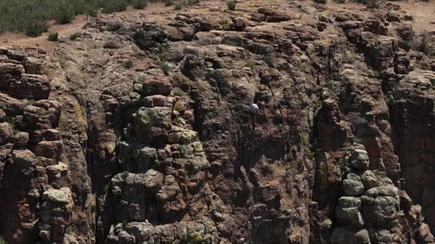 Aerial of rock climber on Table Mountain in Golden Colorado in summer Video stock 337130611