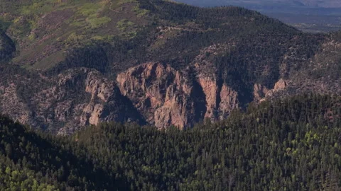 Aerial of rocky cliffs and in Carson National Forest near Questa New Mexico Stock Footage 345616441