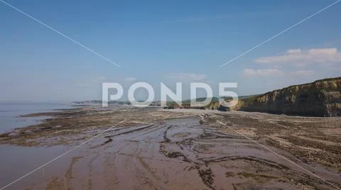 Aerial of Rocky Jurrasic beach near Kilve Somerset England with many fossils Stock Photos