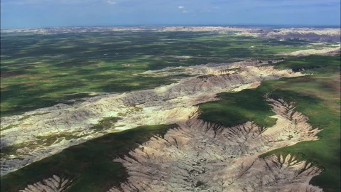 Aerial of rocky landscape with grass fields, Patchy landscape of green and rock Stock Footage 109452801