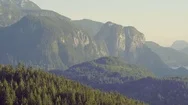 Aerial Of Rocky Mountain Ranges And Vast Coniferous Mountains Squamish Bc Stock Footage
