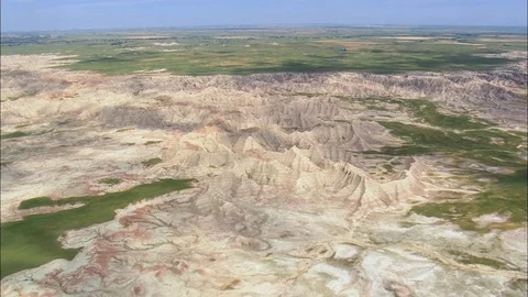 Aerial of rocky structured landscape with grass patches, Flight Over East Side Stock Footage 109452780