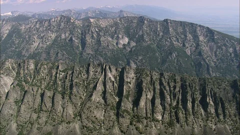 Aerial of rolling mountain ranges, Over The Bitterroot Mountain Ridges Stock Footage 109468531