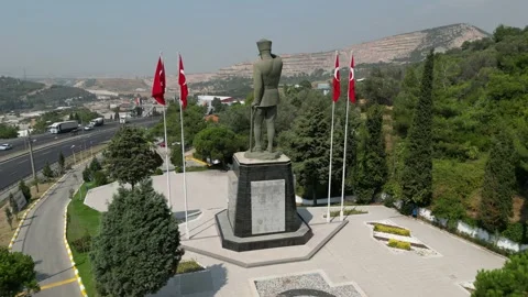Aerial Rotating Shot back to front of the  Big Ataturk Statue with Turkish Flags Stock Footage 208632237